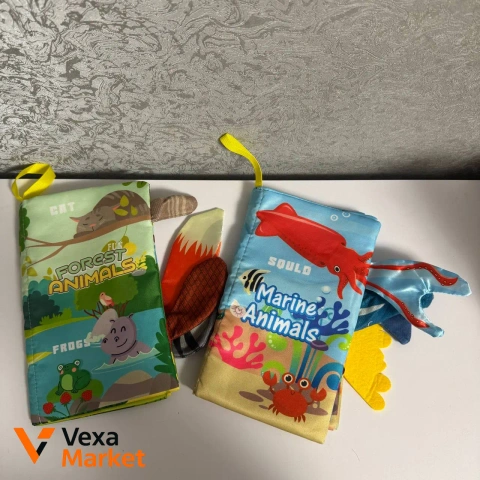 Розвиваючі тактильні книжки-шуршалки та іграшки для немовлят