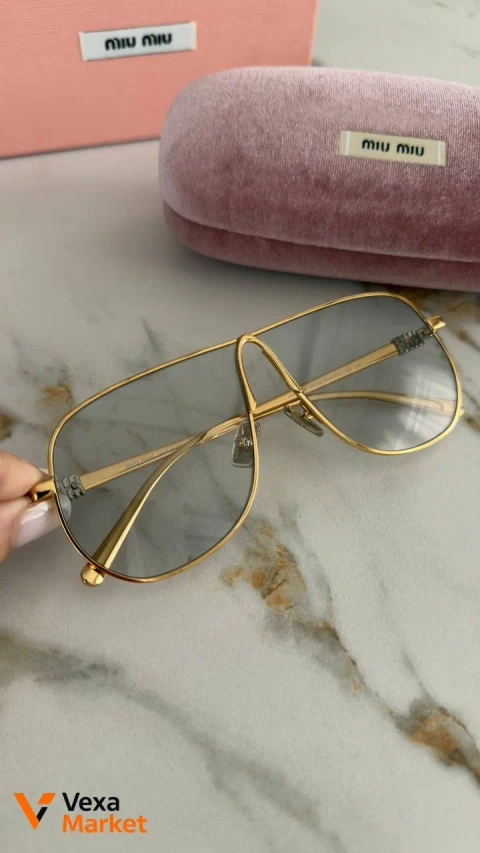 Окуляри Miu Miu золотисті