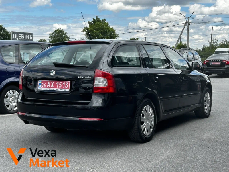 Skoda Octavia 2009 1.6 л Бензин Ручна / Механіка Чорний — фото 2
