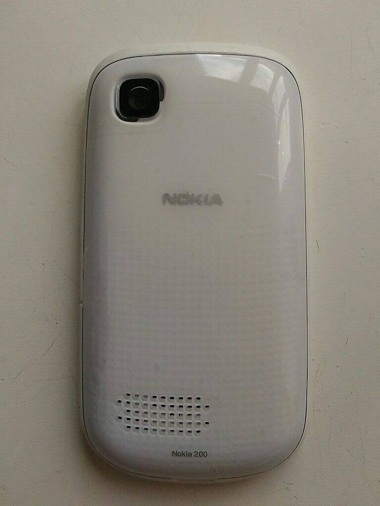 Телефон Nokia Asha 201 — фото 6