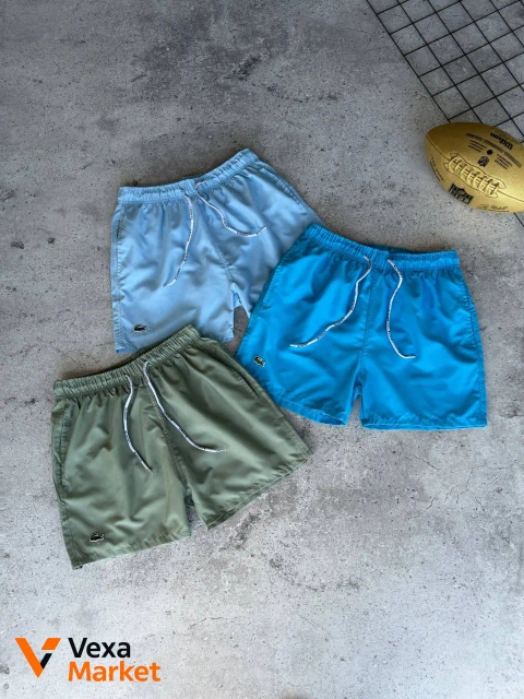 Плавальні шорти Lacoste з принтом при контакті з водою