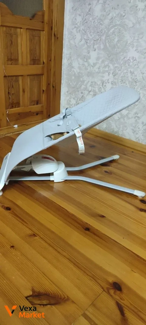 Шезлонг з колисковим центром