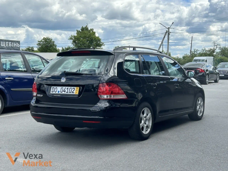 Volkswagen Golf 2008 1.6 л Бензин Чорний — фото 2