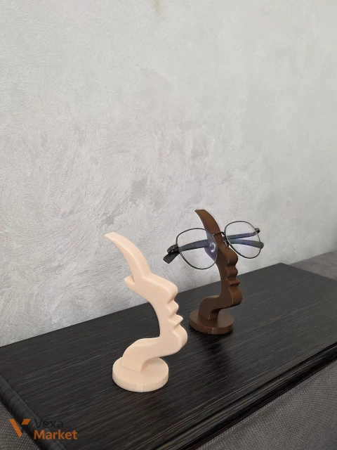 3D-печатная подставка для очков в форме абстрактного профиля лица