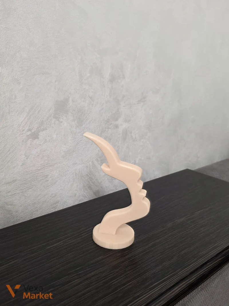 3D-печатная подставка для очков в форме абстрактного профиля лица — фото 4