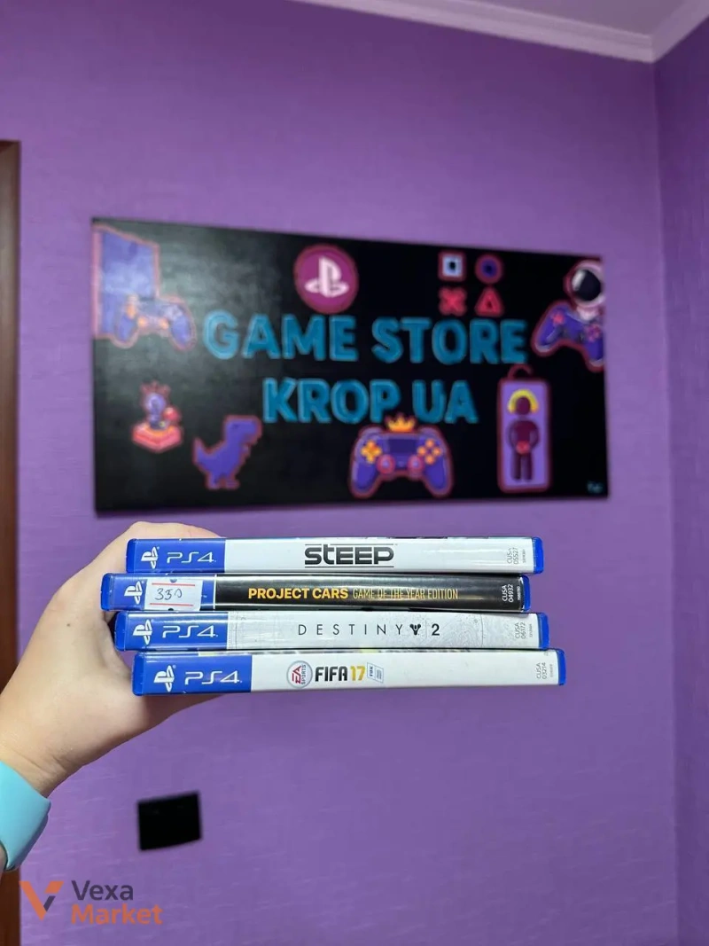 Игровой набор PS4 с 2 геймпадами, зарядной станцией и 4 играми — фото 4