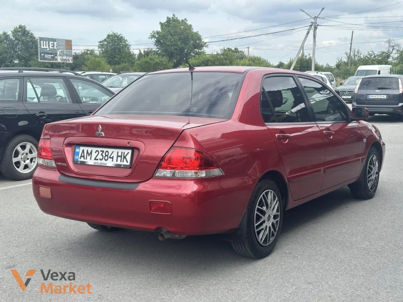 Mitsubishi Lancer 2008 1.6л Автомат Красный — фото 4