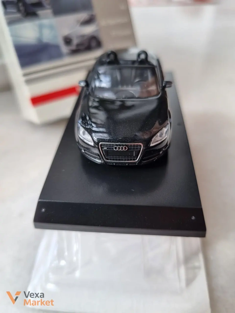 Модель автомобиля Kyosho Audi TT Roadster — фото 4