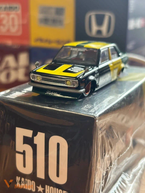Модель машинки Kaido House x Mini GT Datsun Street Racing 510 V2