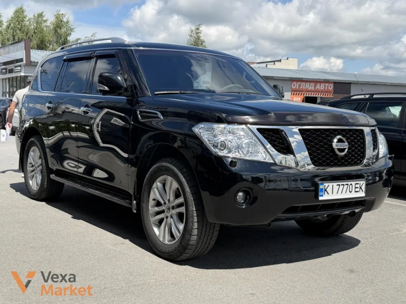 Nissan Patrol 2011 5.6 л Газ/Бензин Чорний — фото 2