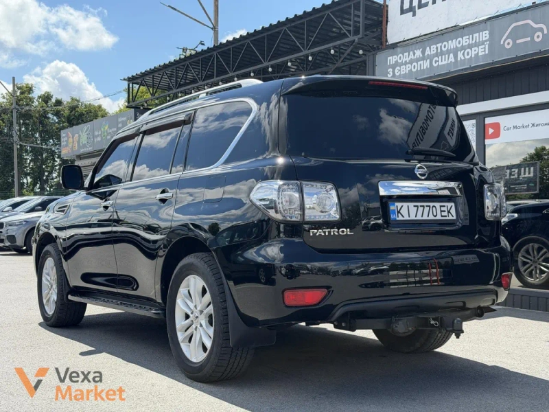 Nissan Patrol 2011 5.6 л Газ/Бензин Чорний — фото 4