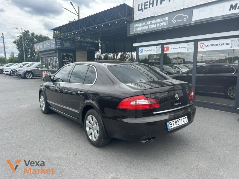 Skoda Superb II покоління 2012 Бензин 1.8 л. Коричневий — фото 3