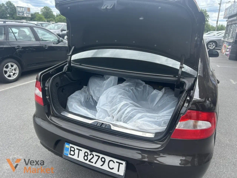 Skoda Superb II покоління 2012 Бензин 1.8 л. Коричневий — фото 5