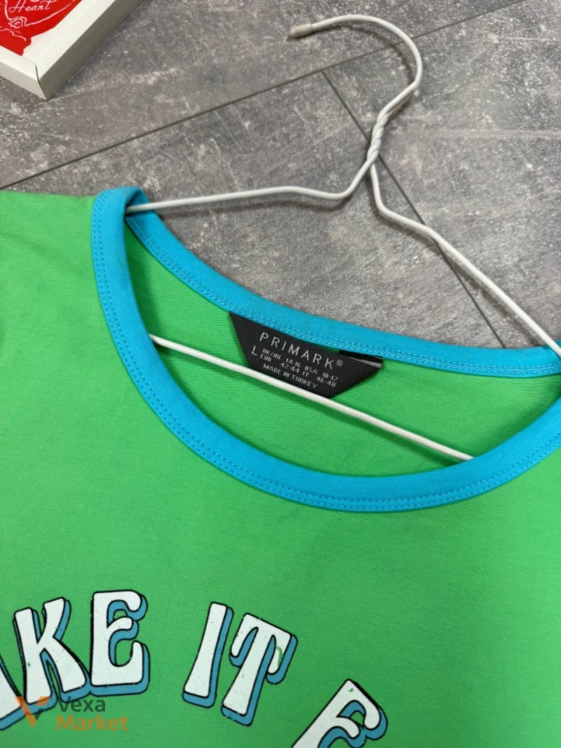 Зелена кроп-футболка Primark з принтом — фото 3