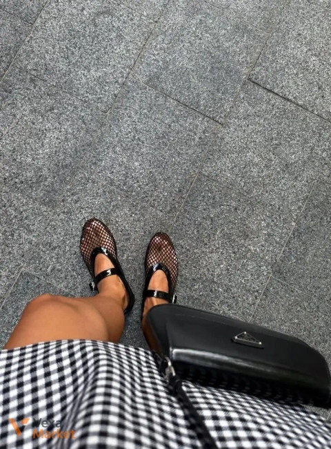 Alaia mules black