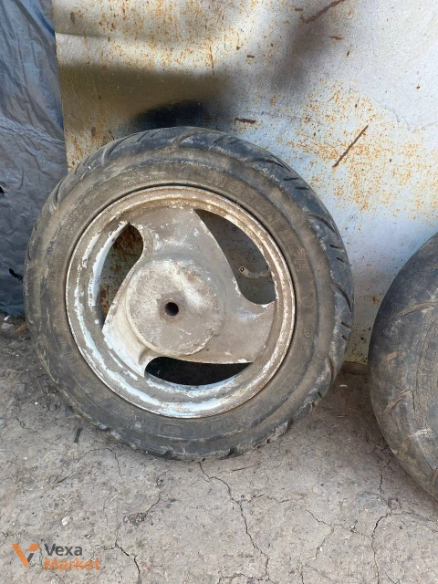 Диски з гумою для скутера
