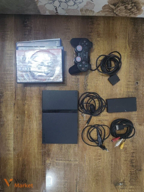 Ігрова приставка Sony PlayStation 2 Slim з Dualshock 2 та 4 дисками