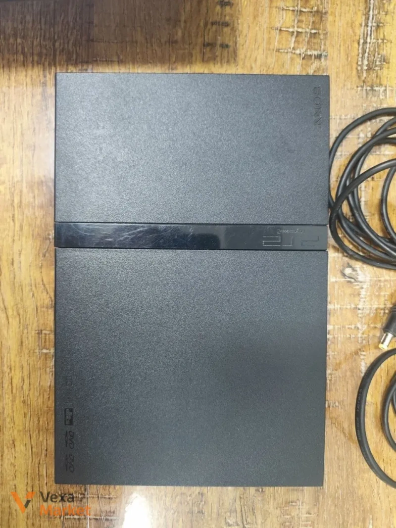 Ігрова приставка Sony PlayStation 2 Slim з Dualshock 2 та 4 дисками — фото 2