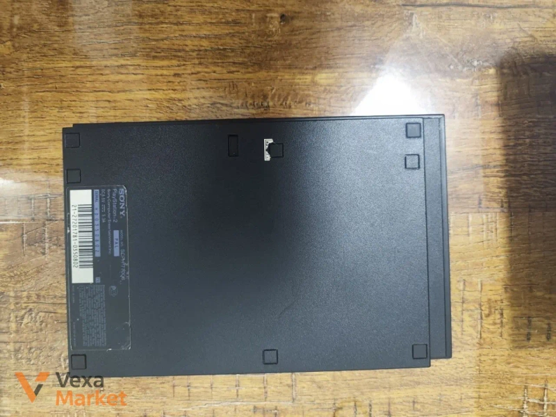 Ігрова приставка Sony PlayStation 2 Slim з Dualshock 2 та 4 дисками — фото 3