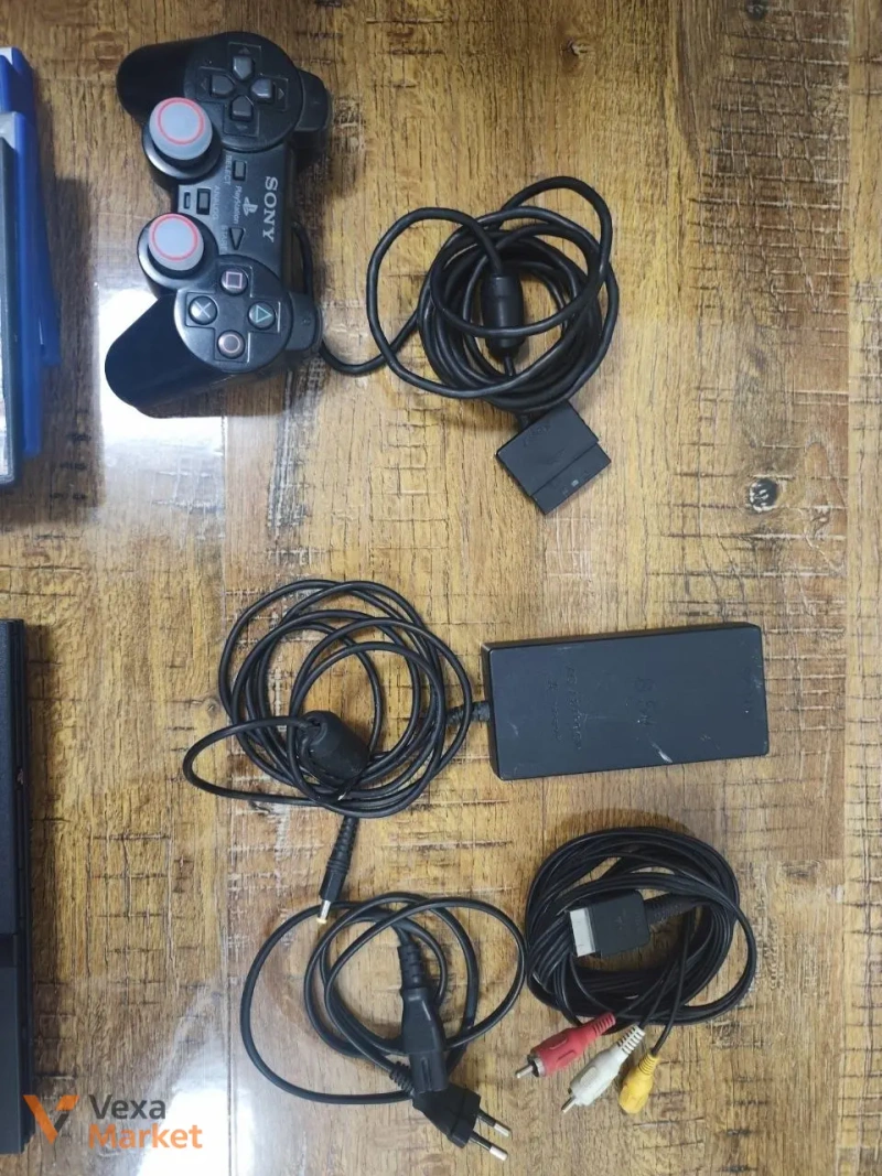 Ігрова приставка Sony PlayStation 2 Slim з Dualshock 2 та 4 дисками — фото 4
