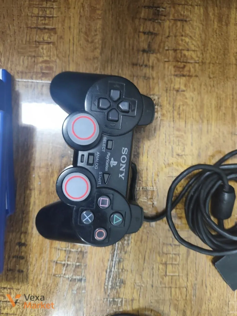 Ігрова приставка Sony PlayStation 2 Slim з Dualshock 2 та 4 дисками — фото 5