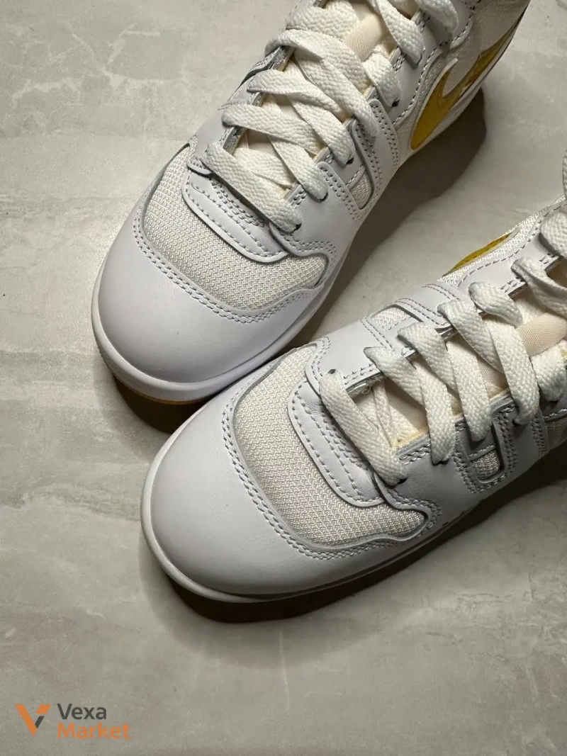 Кросівки Nike шкіряні біло-жовті — фото 4