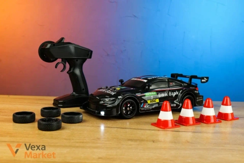 Машинка на радіокеруванні 1:16 4WD з протиударним корпусом та додатковими колесами