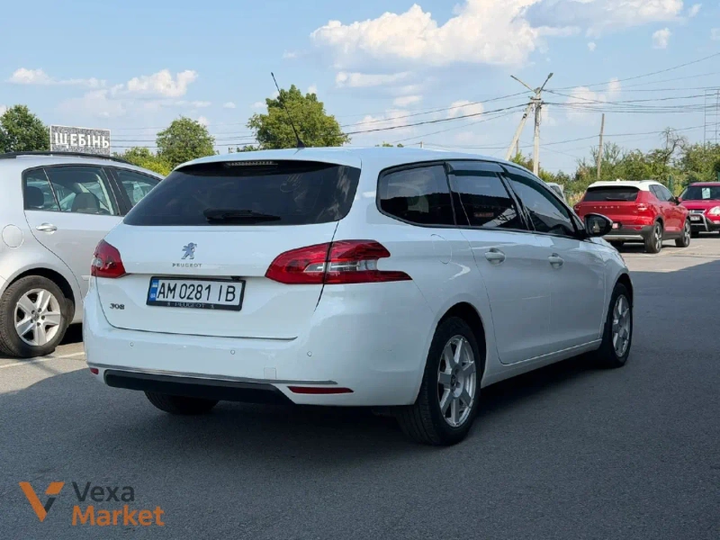 Peugeot 308 2014 Белый Дизель 1.6 л. — фото 2