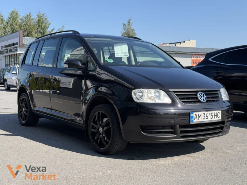 Volkswagen Touran I покоління 2004 Дизель 1.9 л Чорний — фото 2