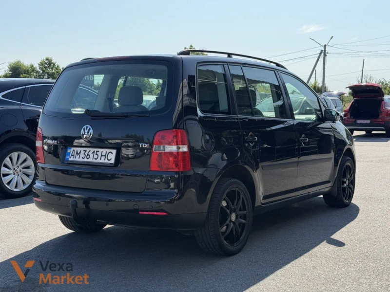 Volkswagen Touran I покоління 2004 Дизель 1.9 л Чорний — фото 3