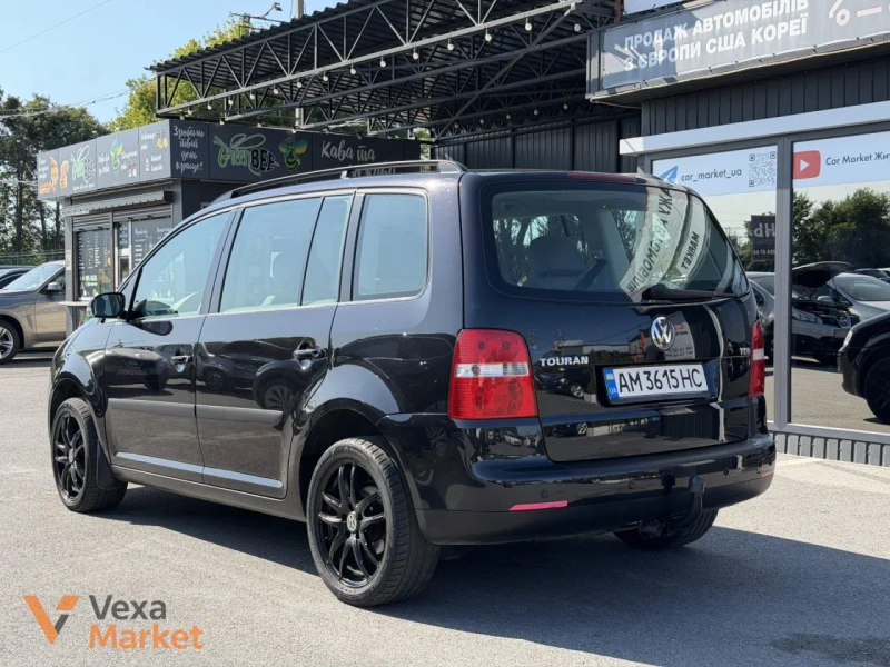 Volkswagen Touran I покоління 2004 Дизель 1.9 л Чорний — фото 4