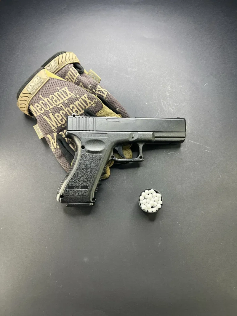 Іграшковий металевий пістолет Glock 17 з глушником C15A+ 6 мм пружинний — фото 3