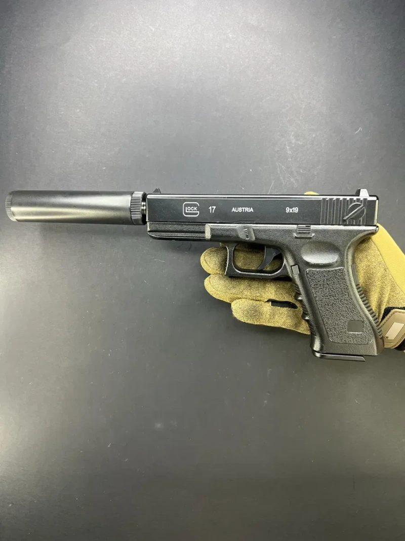 Іграшковий металевий пістолет Glock 17 з глушником C15A+ 6 мм пружинний — фото 4