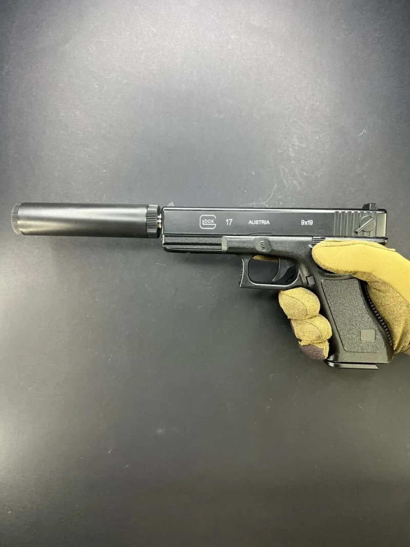 Іграшковий металевий пістолет Glock 17 з глушником C15A+ 6 мм пружинний — фото 5