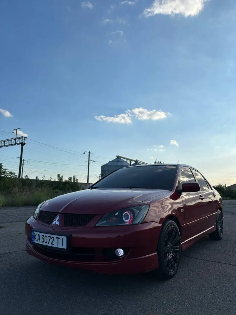 Mitsubishi lancer — фото 2