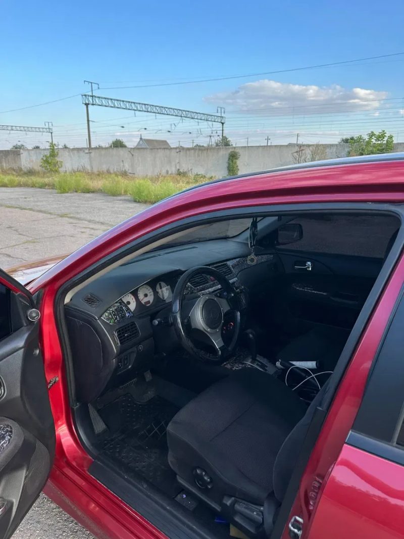 Mitsubishi lancer — фото 3