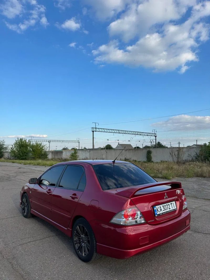 Mitsubishi lancer — фото 4