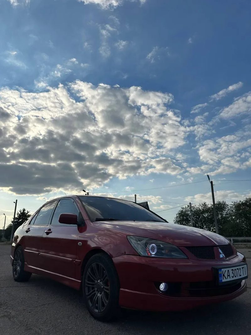 Mitsubishi lancer — фото 5