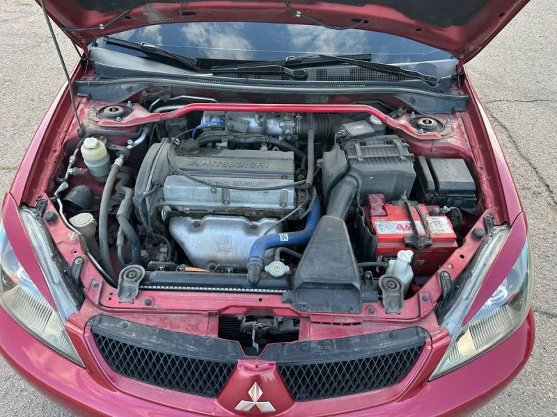 Mitsubishi lancer — фото 6