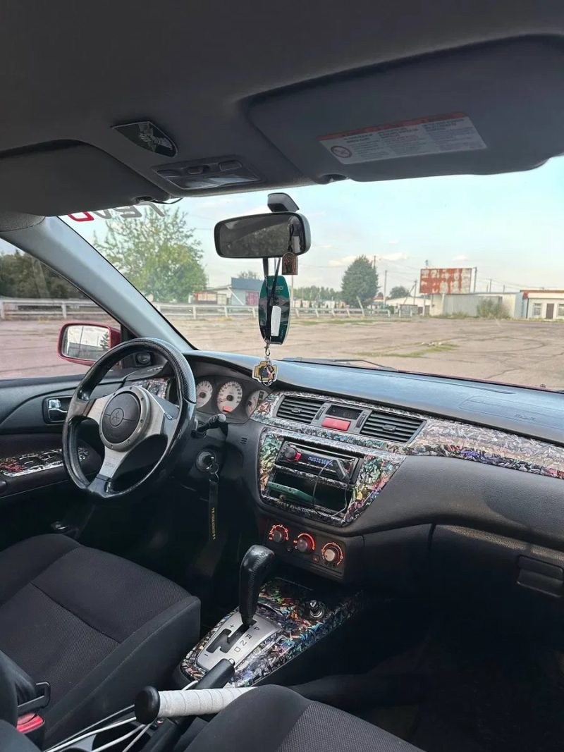 Mitsubishi lancer — фото 7
