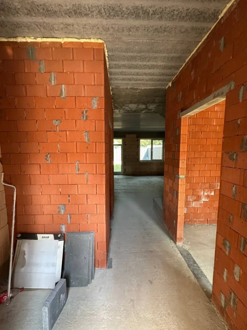 Продам таунхаус в місті Ірпінь на вул. Лисенка, 90 м² та мансарда 40 м², ділянка 1,6 сотки — 88 000 $. Власний передній двір. Вигідна ціна. — фото 2