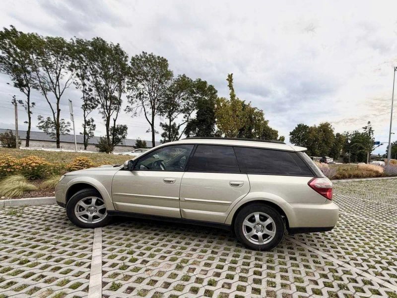 Subaru Outback III 2,5 2009 — фото 2