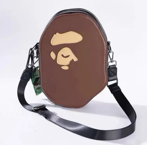 Сумка через плече Bape Ape Head Shoulder Bag у коричневому кольорі.