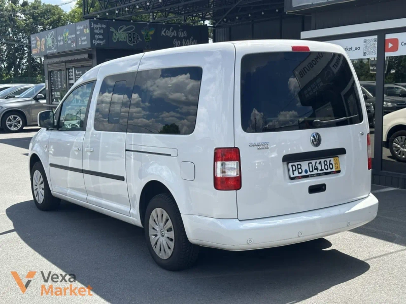 Volkswagen Caddy 2008 Бензин 1.6 л Білий — фото 4
