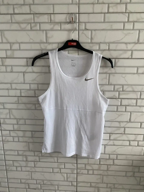 Жіночі спортивні футболки,майки  Nike,Puma,Adidas,Reebok