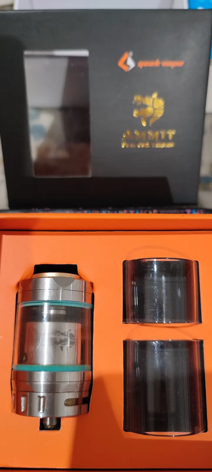 Ammit RTA  + coiles + Japanese cotton + e-liquid Candy King
