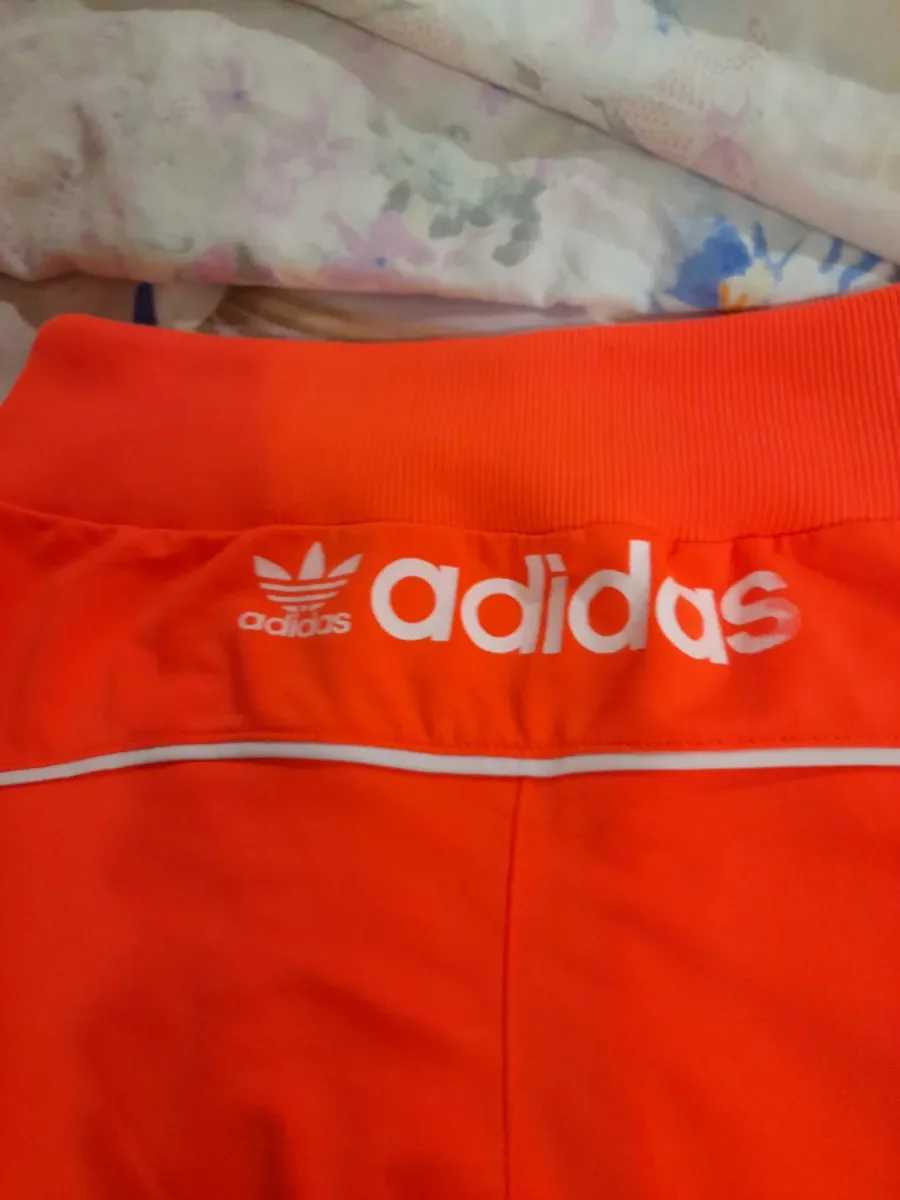 Бріджі жіночі помаранчеві Adidas 46 розмір
