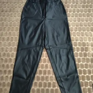 Шкіряні штани