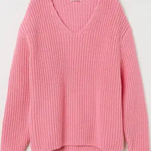 Об’ємний рожевий в’язаний светр від H&M