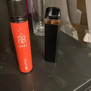 Pod-система Vaporesso с новым картриджем + жидкость Lucky Grapefruit